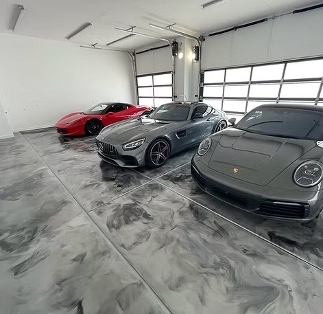 Gold and gray swirled metallic epoxy flooring finish in Boerne, TX